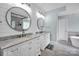 Bright bathroom with dual sinks, marble countertops, and modern fixtures at 12416 Kane Alexander Dr, Huntersville, NC 28078