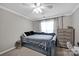 Bright bedroom with a daybed, natural light, dresser, and fan at 12416 Kane Alexander Dr, Huntersville, NC 28078