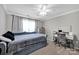 Inviting bedroom showcasing a plush daybed, vanity area and plenty of natural light at 12416 Kane Alexander Dr, Huntersville, NC 28078