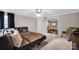Cozy living room featuring plush seating, and views into a dining room and adjacent sitting area at 12416 Kane Alexander Dr, Huntersville, NC 28078