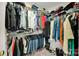 Well-organized walk-in closet providing ample storage for clothing and accessories at 12416 Kane Alexander Dr, Huntersville, NC 28078
