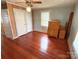Bedroom featuring wood floors, two closets, ceiling fan, and natural light at 125 Hunter St, Salisbury, NC 28144