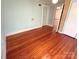 Bedroom featuring wood floors, a closet, ceiling fan, and natural light at 125 Hunter St, Salisbury, NC 28144
