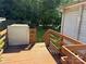 Wooden deck with ramp lift providing accessible backyard entry at 125 Hunter St, Salisbury, NC 28144