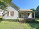 Charming single-story home with a welcoming front porch and well-maintained lawn at 125 Hunter St, Salisbury, NC 28144