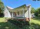 Charming single-story home with covered porch and brick foundation in well-maintained neighborhood at 125 Hunter St, Salisbury, NC 28144
