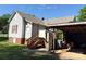 Exterior shot of the back of the home with carport and lift system at 125 Hunter St, Salisbury, NC 28144