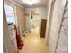 A small utility room including water heater and additional storage space at 125 Hunter St, Salisbury, NC 28144