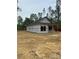Unfinished home with covered front porch and large yard awaits customization at 128 Loblolly Dr, Mount Gilead, NC 27306