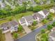 Charming neighborhood aerial view showcases well-maintained homes, mature trees, and manicured lawns at 12832 Heath Grove Dr, Huntersville, NC 28078