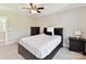 Bedroom featuring neutral walls, carpet, and a window with views of the outdoors at 129 Overlook Ridge Ln, Davidson, NC 28036