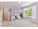 Bright bedroom featuring a window and a fun loft bed, perfect for a room at 129 Overlook Ridge Ln, Davidson, NC 28036