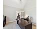 Home office with a large work desk, neutral walls, and carpeted floors at 129 Overlook Ridge Ln, Davidson, NC 28036