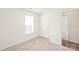 Bedroom featuring neutral carpet and a door at 13408 Golden Apple Ct, Charlotte, NC 28215