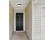 Close-up of a stylish front door, showcasing the entrance to the home at 13408 Golden Apple Ct, Charlotte, NC 28215
