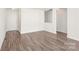 Bright living room with light walls, new flooring, and an open layout at 13408 Golden Apple Ct, Charlotte, NC 28215