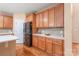 Charming kitchen with wood cabinets, white countertops, tile backsplash and stainless steel appliances at 14104 Kendrick Cross Rd, Charlotte, NC 28273