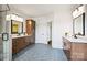 Large bathroom with double sinks and a combination shower and bath at 14210 Kershaw Cir # 20, Huntersville, NC 28078