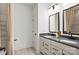 Stylish bathroom featuring double vanities with sleek fixtures and modern cabinetry at 14210 Kershaw Cir # 20, Huntersville, NC 28078