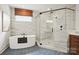 Modern bathroom showcasing stylish tiles, sleek fixtures, and a glass-enclosed shower at 14210 Kershaw Cir # 20, Huntersville, NC 28078