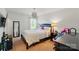 Neutral bedroom with carpet floors, stylish lighting, and great natural light at 14316 Baytown Ct, Charlotte, NC 28078