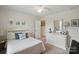Bedroom featuring a white bed, a white dresser, and white walls at 14316 Baytown Ct, Charlotte, NC 28078