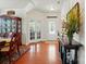 Inviting foyer with hardwood floors, elegant decor, and a view of the dining room and living spaces at 14316 Baytown Ct, Charlotte, NC 28078