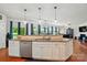 Bright eat-in kitchen with island and views to the living room at 14316 Baytown Ct, Charlotte, NC 28078