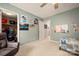 Cozy bedroom features neutral carpeting, a ceiling fan and a walk-in closet with ample storage space at 144 Chickasaw Dr, Shelby, NC 28152