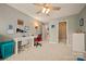 Bedroom with carpeted floor featuring two desks and a ceiling fan at 144 Chickasaw Dr, Shelby, NC 28152