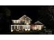 Two-story brick home with professional lighting at 144 Chickasaw Dr, Shelby, NC 28152