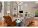 Bright living room with fireplace, high ceilings, and cozy seating at 144 Chickasaw Dr, Shelby, NC 28152
