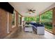 Covered patio with outdoor furniture, ceiling fan, barbecue grill, and brick exterior at 144 Chickasaw Dr, Shelby, NC 28152