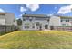 Expansive backyard with a well-maintained lawn, enclosed by a wooden fence for privacy at 14501 Asheton Creek Dr, Charlotte, NC 28273