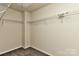 Walk-in closet with metal storage racks offering ample space for organization and storage at 14501 Asheton Creek Dr, Charlotte, NC 28273