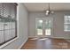 Dining area with hardwood floors, lots of light, and door leading to the backyard at 14501 Asheton Creek Dr, Charlotte, NC 28273