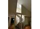 Unique spiral staircase in a multi-story home with a skylight, adding architectural interest at 1451 Blueberry Ln, Charlotte, NC 28226