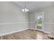 Dining room with wood floors and access to outside at 154 Stable Brook Ln, Taylorsville, NC 28681