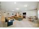 Spacious finished basement with recreational area, fireplace, and neutral carpeting at 161 Leaning Tower Dr, Mooresville, NC 28117