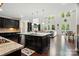 Spacious open kitchen and living area with hardwood floors and natural light at 161 Leaning Tower Dr, Mooresville, NC 28117