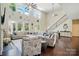 Open-concept living room filled with natural light and stylish furnishings at 161 Leaning Tower Dr, Mooresville, NC 28117