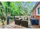 Cozy back deck with comfortable outdoor seating, perfect for relaxation and entertaining at 1809 Jameston Dr, Charlotte, NC 28209