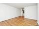 Bright living room with hardwood floors and neutral walls at 1809 Jameston Dr, Charlotte, NC 28209