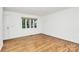 Bright living room with hardwood floors and ample natural light at 1809 Jameston Dr, Charlotte, NC 28209