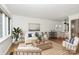 Inviting living room with hardwood floors, comfortable seating and natural light at 1809 Jameston Dr, Charlotte, NC 28209