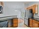 Bright kitchen showcasing stainless steel appliances, granite countertops, and an adjacent dining area at 2016 Townview Dr, Kannapolis, NC 28081