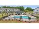 Overhead shot of sparkling blue community pool with lounge chairs at 3125 Beacon Heights Rd, Indian Land, SC 29707
