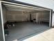 Spacious unfinished two car garage provides ample parking and storage space at 3125 Beacon Heights Rd, Indian Land, SC 29707
