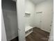 Convenient mudroom with a bench, storage, and coat hooks for organization at 3125 Beacon Heights Rd, Indian Land, SC 29707