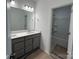 Bathroom featuring double sinks, a large mirror, and a shower-tub combination at 3127 Beacon Heights Rd, Indian Land, SC 29707